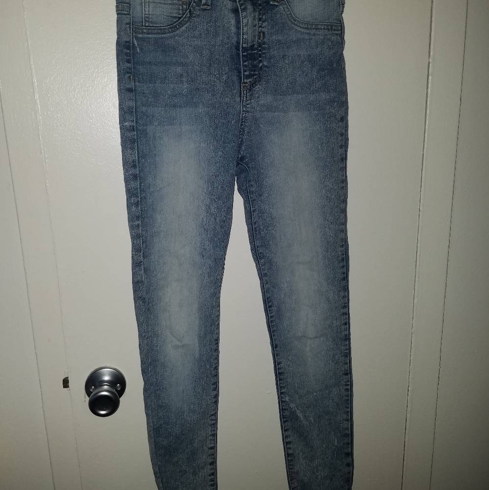 Skinny high-waisted denim jeans.